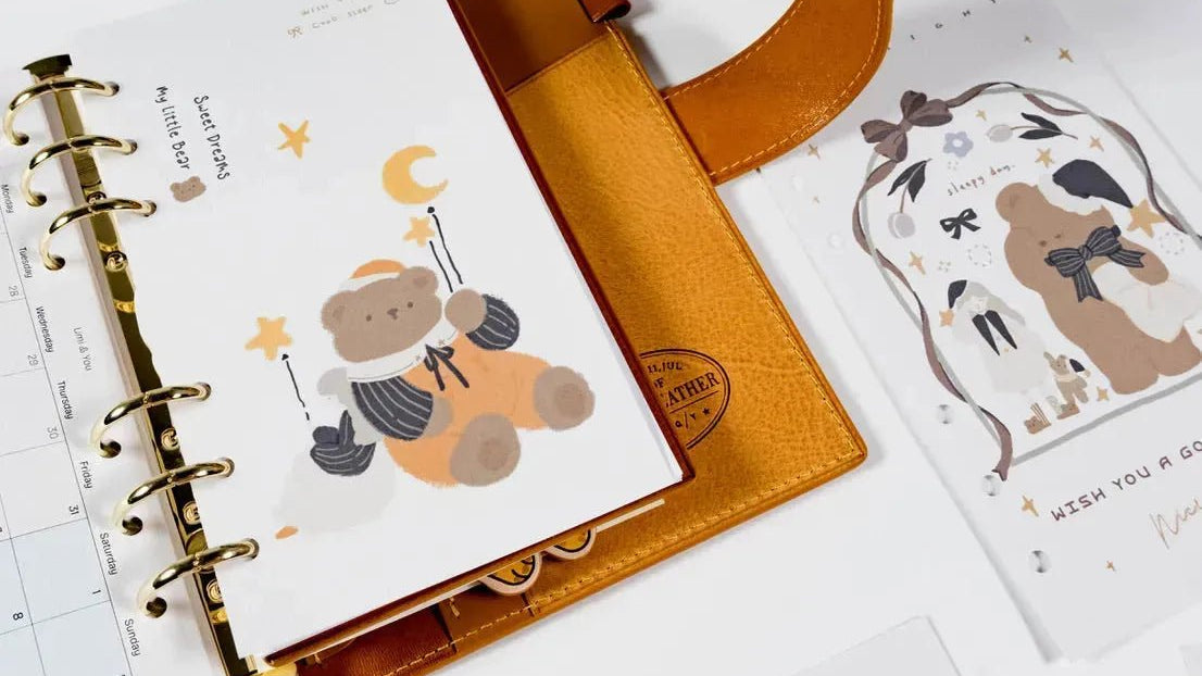 Ring planner with illustrated planner refill pages