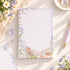 Blooming Days A5 grid notepad with soft floral watercolour border and tear-off pages
