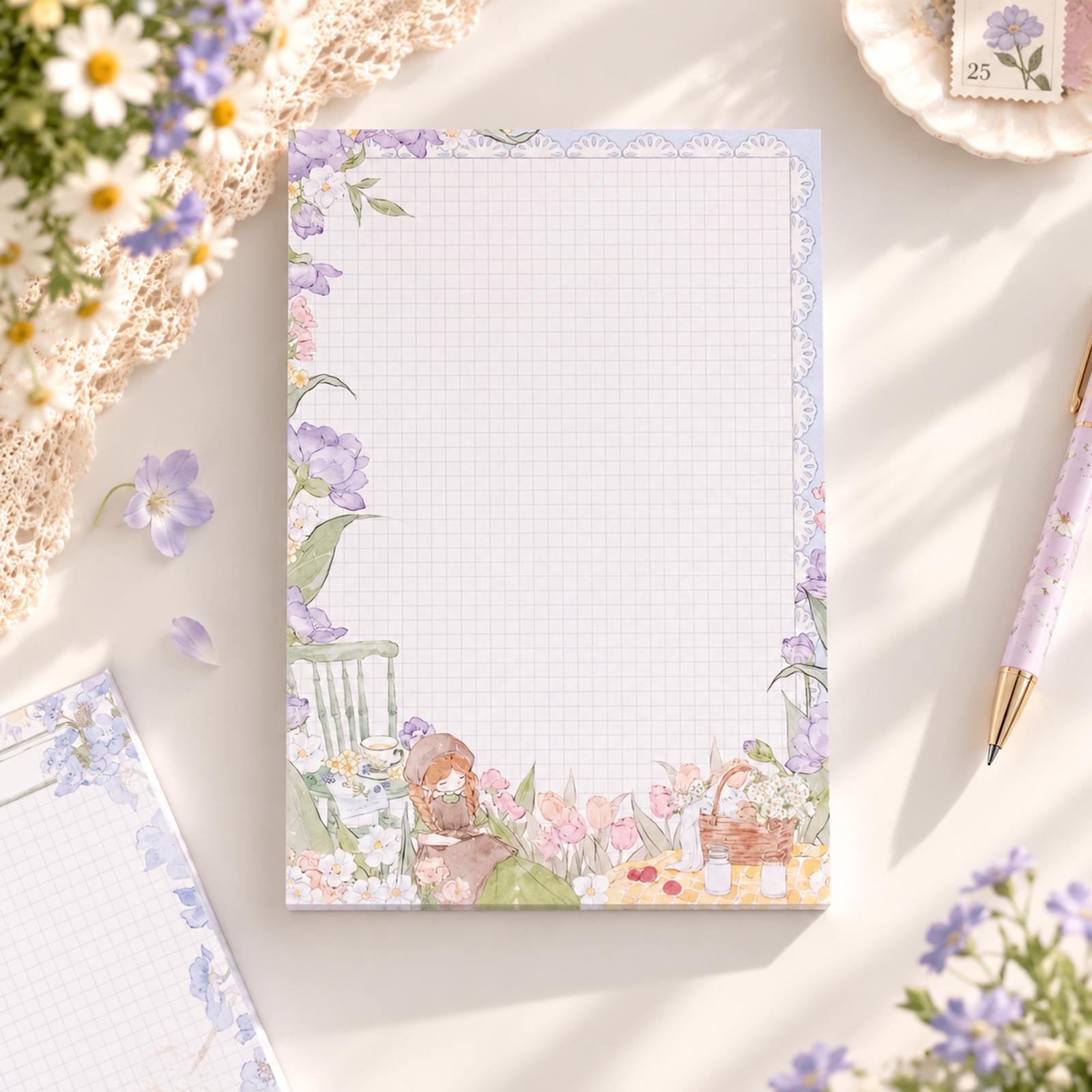 Blooming Days A5 grid notepad with soft floral watercolour border and tear-off pages