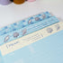 Close-up of seashell and ocean-inspired header design on Summer Beach notepad - Miouva