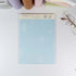 Summer Beach B5 notepad with blue grid layout and seaside design