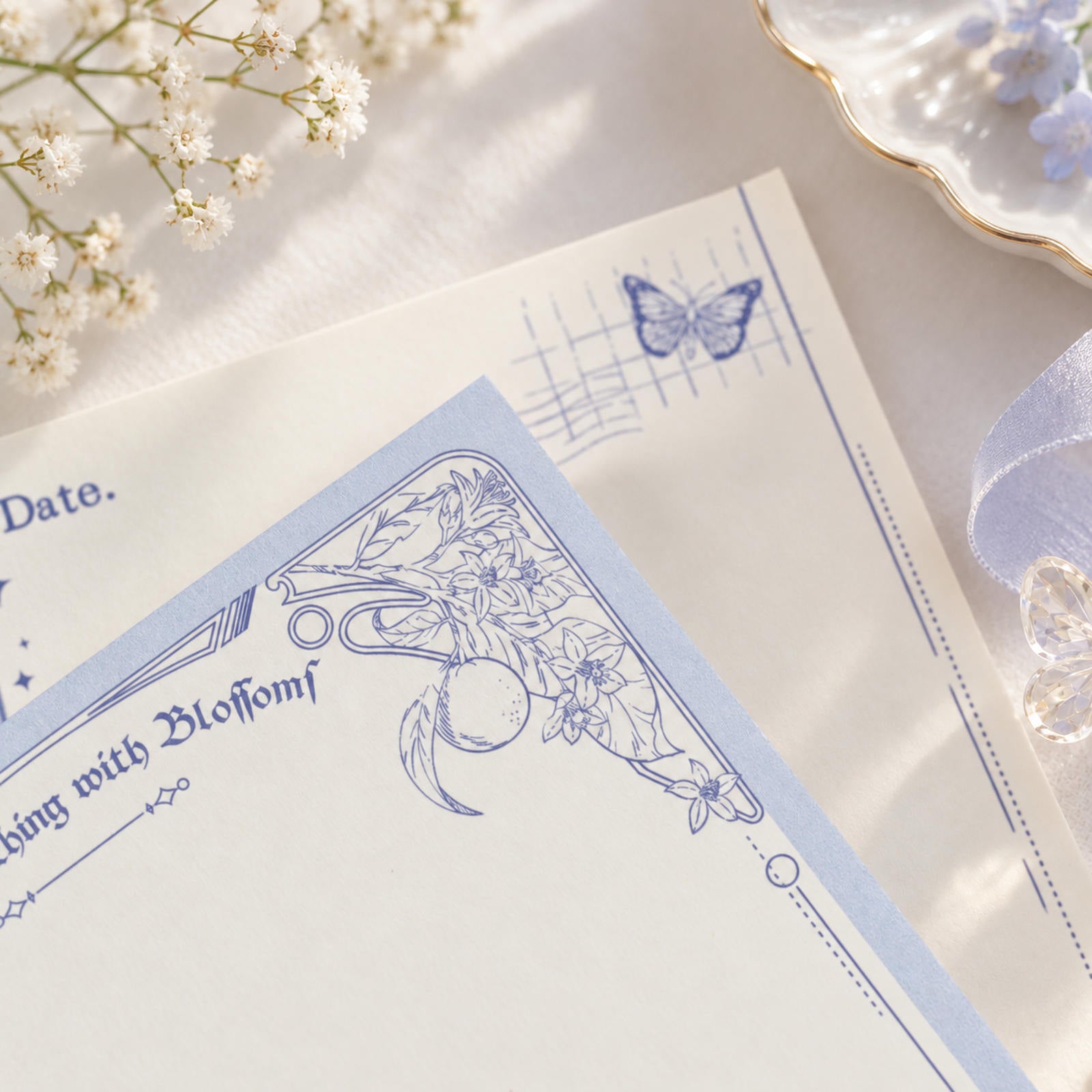 Butterfly & Flower A6 notepad with hand-drawn butterfly and floral details