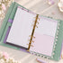 Pink & Ink Personal planner refills shown in a ring planner