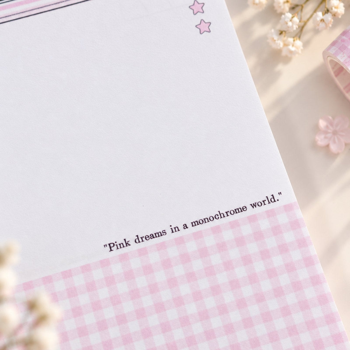 Pink & Ink notepad page with pink check pattern and printed detail