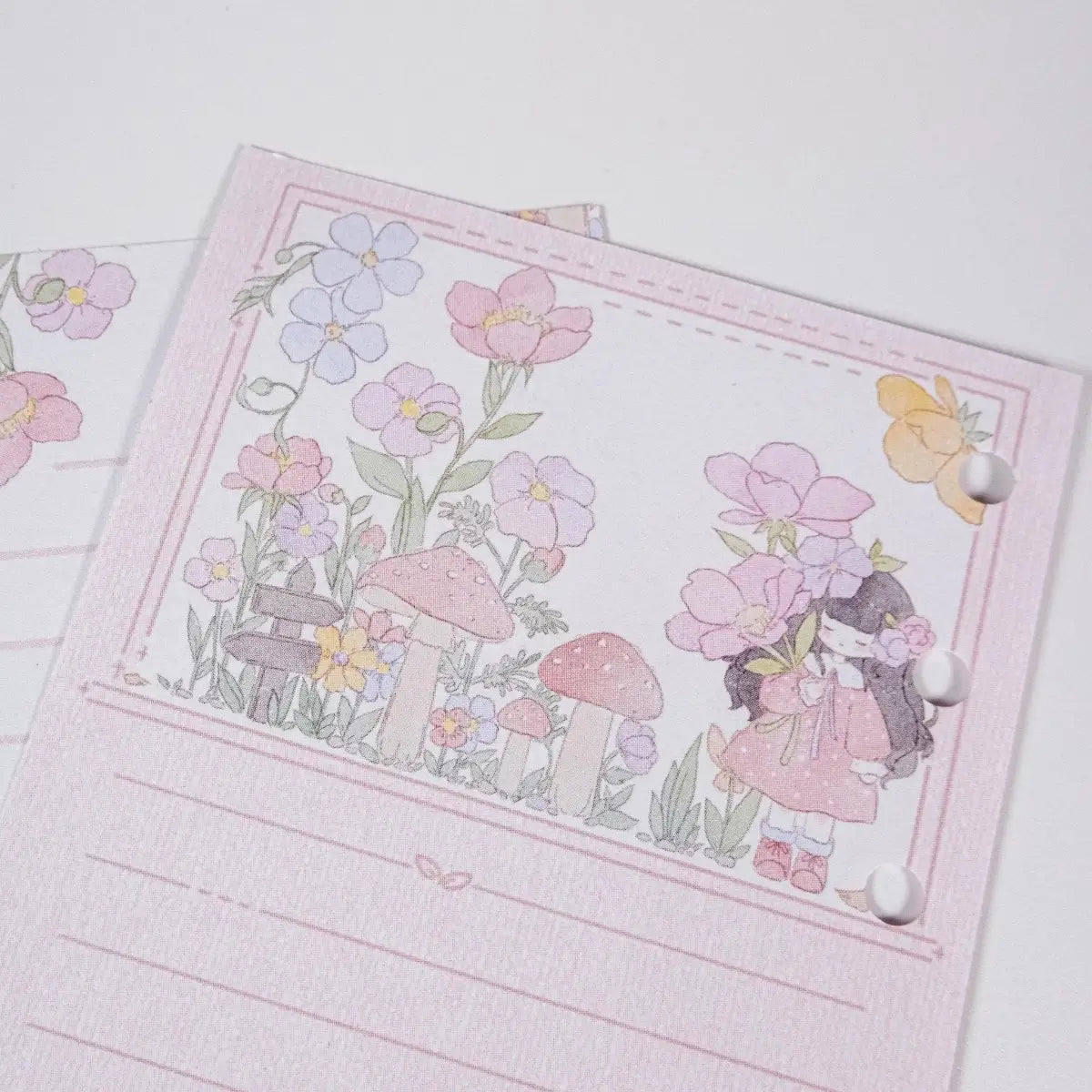 Close-up of Pink Primrose Notepad showing delicate primrose illustration and smooth FSC-certified 120gsm paper - Miouva