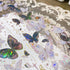Détail du ruban PET Purple Butterfly Bloom avec ailes à l’éclat galaxie et petits motifs célestes