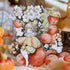 Snow White PET tape close-up with a small character among red apples and white blossoms