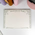 Close-up of Yuzu Blossom B5 notepad, floral line art, and paper texture - Miouva